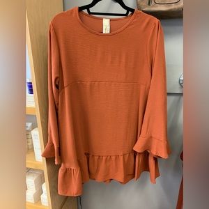 Orange long sleeve flowy top